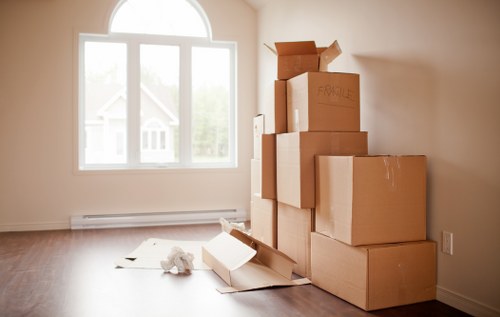 Packed moving boxes ready for loading into a van in Harringay