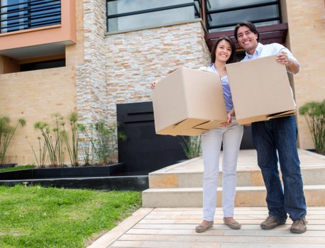 Professional movers loading items carefully for a Harringay relocation