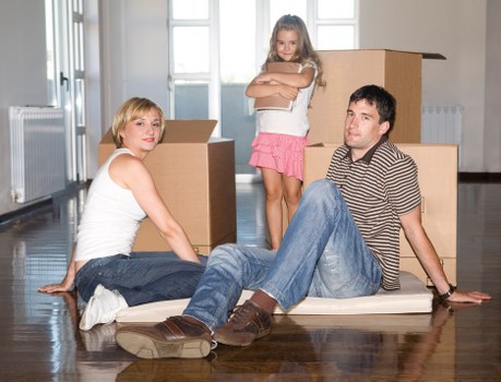 Shared house student move in Harringay with packed boxes and furniture